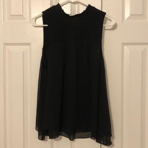 Black flowy sleeveless top. Size L. Blouse.
